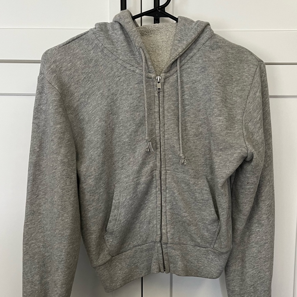 Brandy Melville Women’s Gray Zip-Up Hoodie.